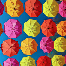 Load image into Gallery viewer, Pattern of colorful umbrellas on a blue background
