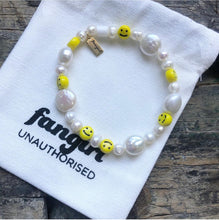 Load image into Gallery viewer, Pearl and smiley face stretch bracelet with Fangirl Unauthorised bag
